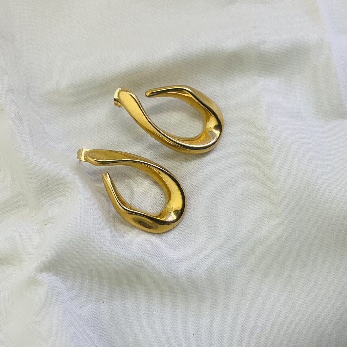 Sculptural Liquid Gold Earrings | Gold Twisted Oval Hoops